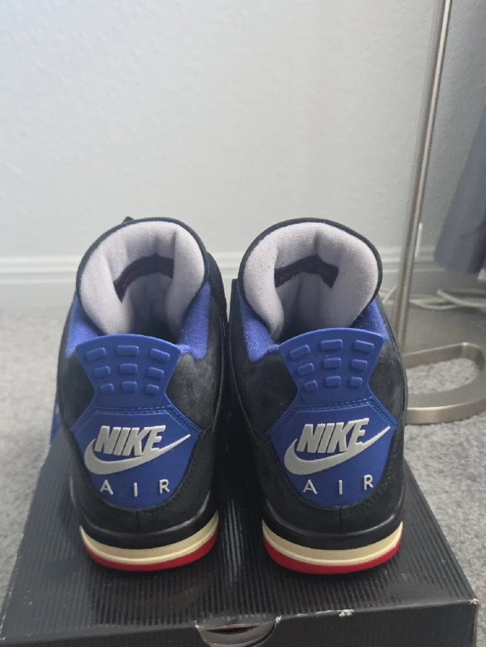 Jordan Men's Black Suede Sneakers with Red and Blue Accents